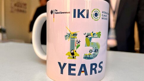 Mug with the logo 15 years