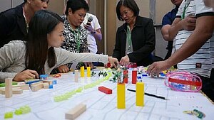 National government partners are mapping out climate policy and urban design interventions for resilience-building at a workshop of the Building Climate Resiliency through Urban Plans and Designs (BCRUPD) Project; Photo: UN Habitat Philippines